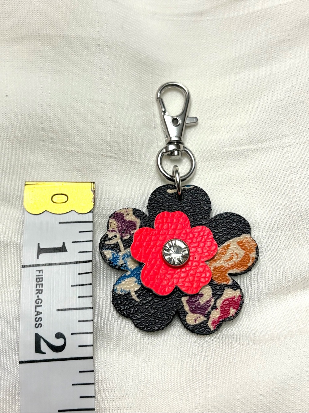 Upcycled COACH Floral Leatherette Keychain Charm in Black and Pink - Picture 3 of 5